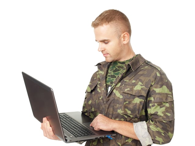  young army soldier with a lapt 53571772.jpg