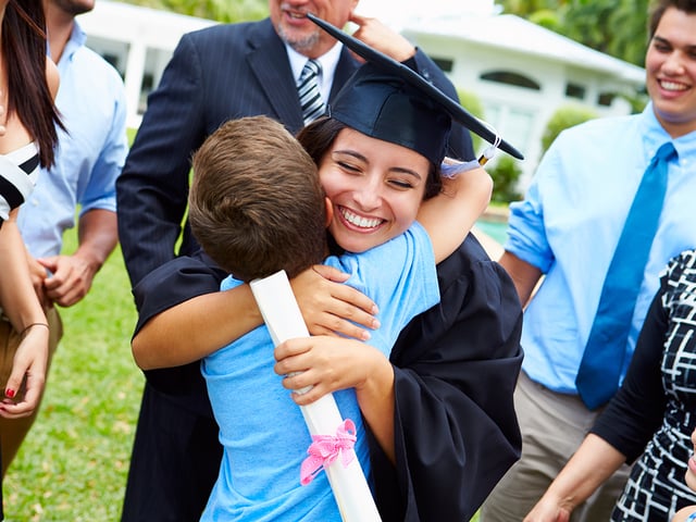graduation child parent 65874655.jpg