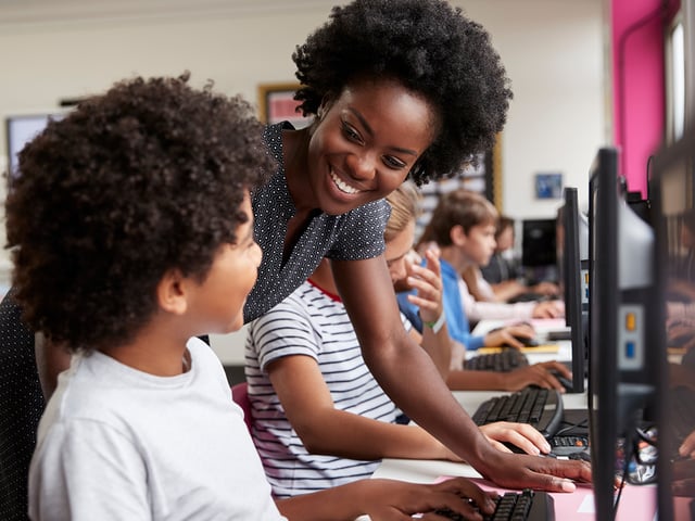 parapro helping student.jpg