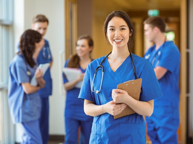 smiling nurse foreground.jpg