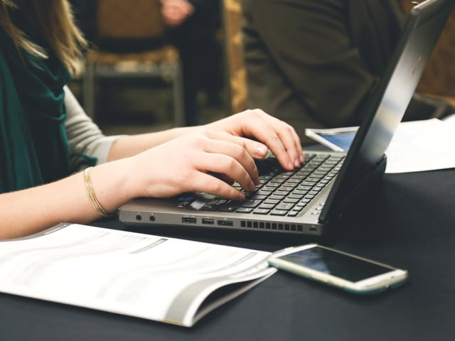Woman hands on keyboard.jpg
