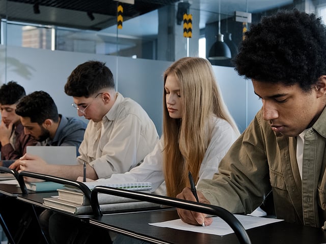 students taking written test.jpg