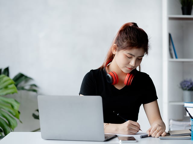 Asian Teenage Woman studying.jpg