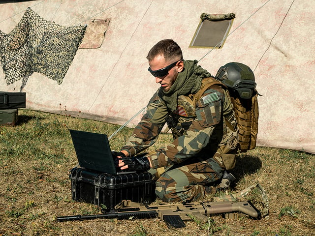 soldier with glasses and computer.jpg