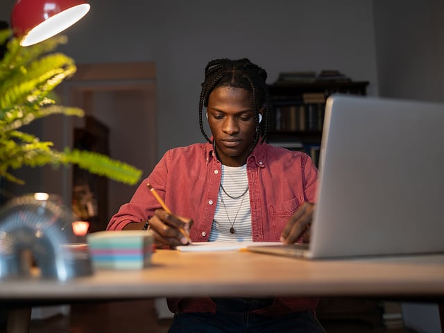 Focused Young African American Man Studying.jpg