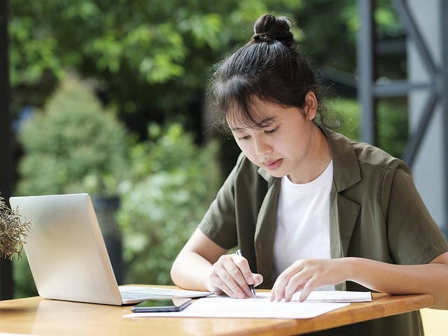 Young Asian Woman Studying.jpg