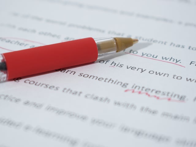 red pen on text.jpg